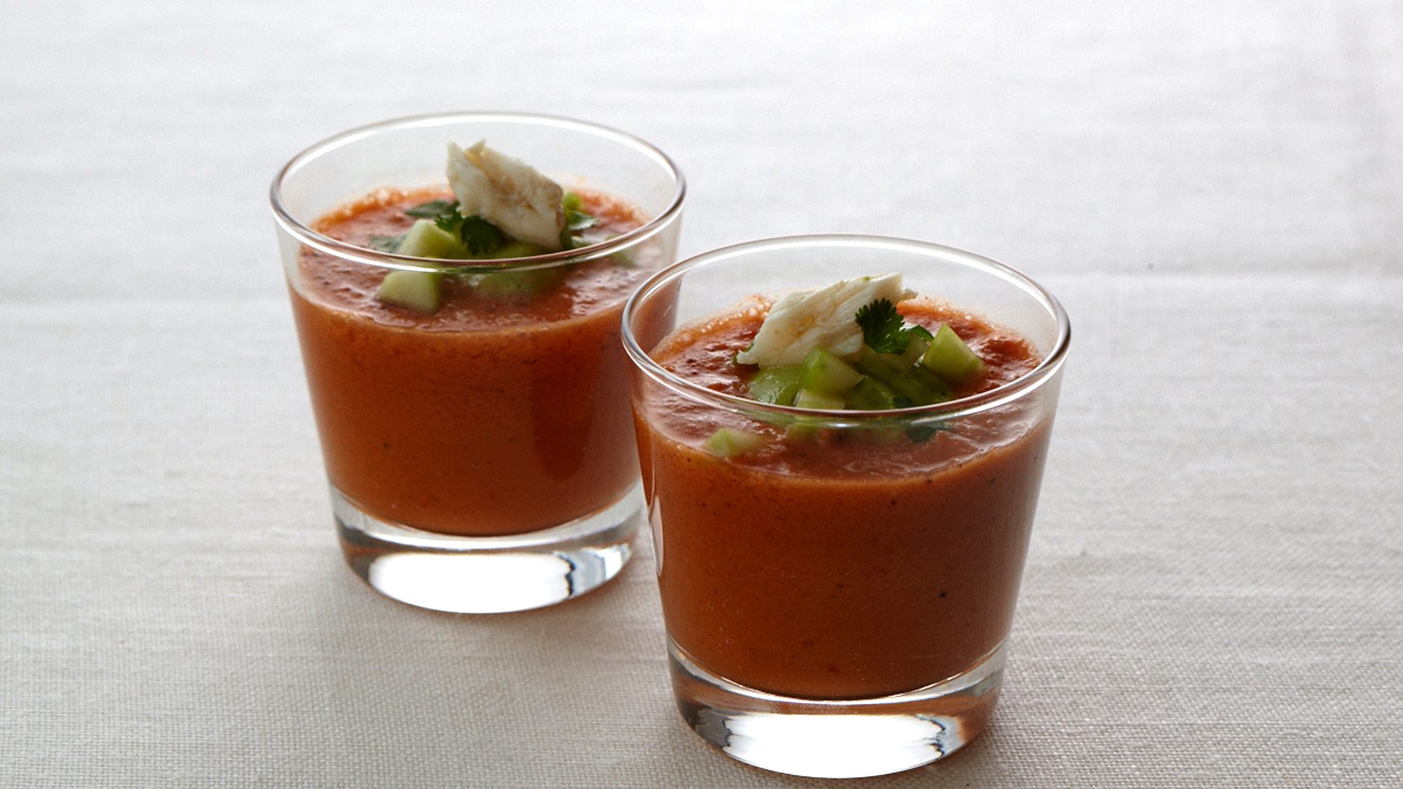 https://images-cdn.welcomesoftware.com/Zz01OWIzM2IyY2U2NmM0Mjk0NDNlMWZmZDdhZmNhODZhZg==/spicy-tomato-gazpacho-soup-with-avocado-puree.jpg