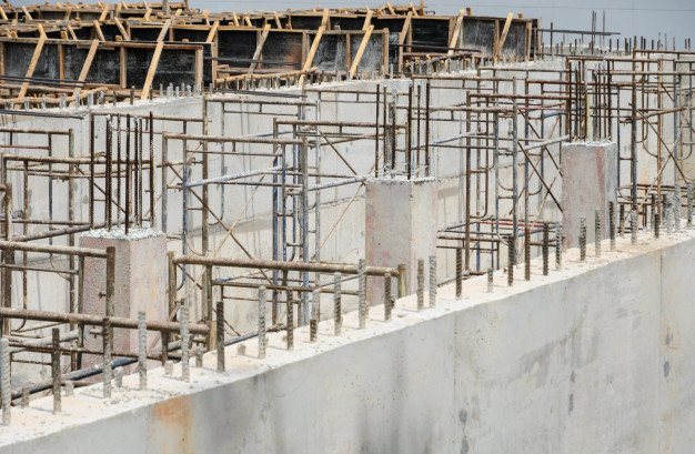 Elevate the house above flood level using concrete beams and columns