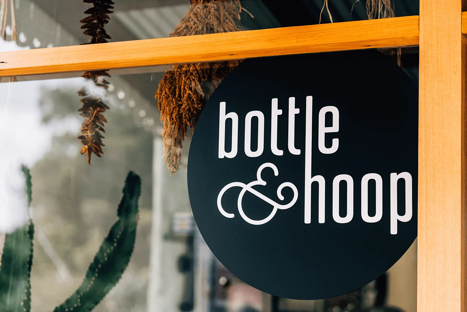 Bottle and Hoop sign