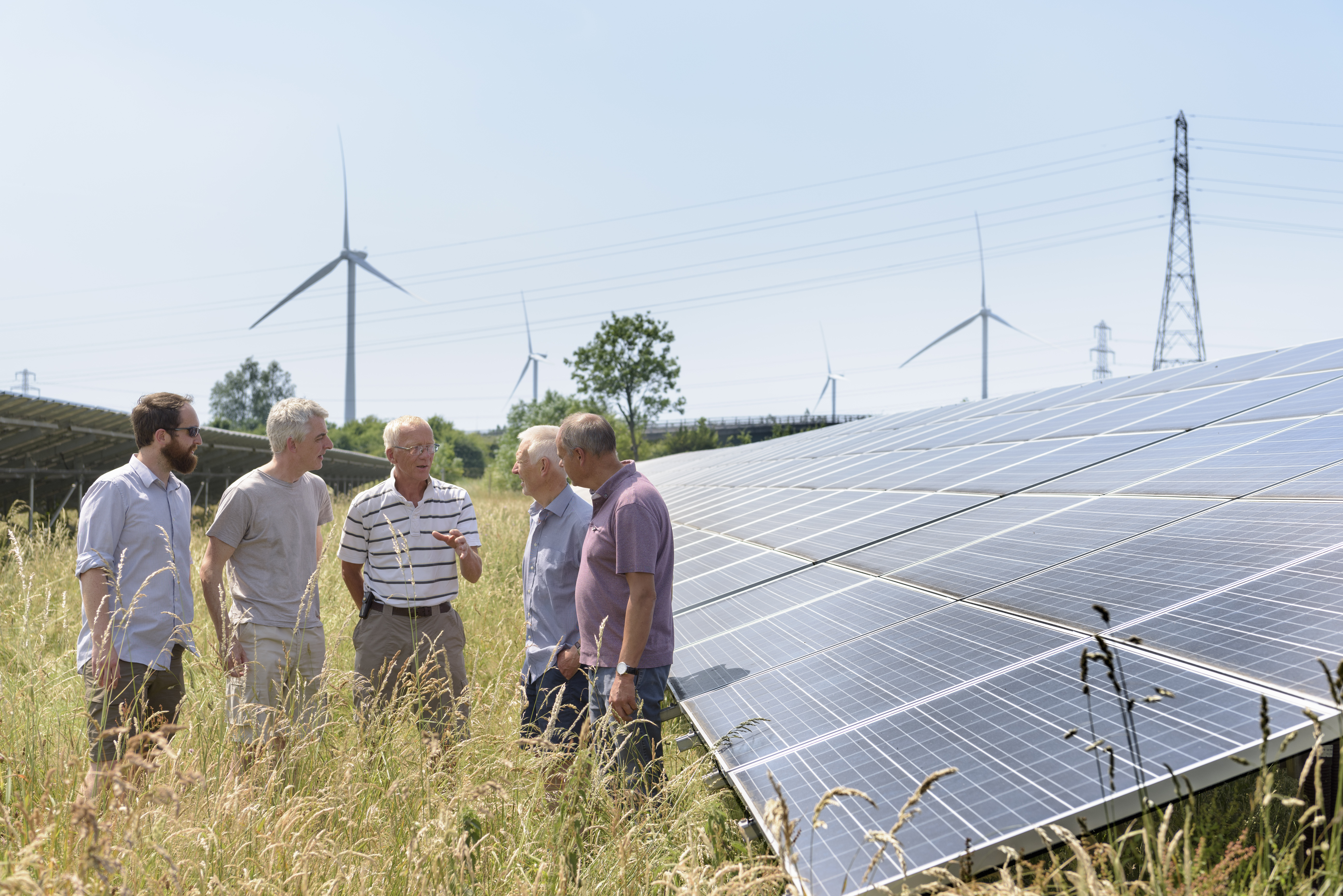 Local community members discussing their solar farm