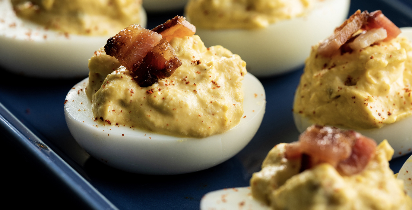 https://images-cdn.welcomesoftware.com/Zz03NTAxNzc5YWYxMzEwNWQ3ZGU1ZjEzYzcxYjM4NDI2MQ==/Tangy-Deviled-Eggs-Desktop.jpg?width=1366