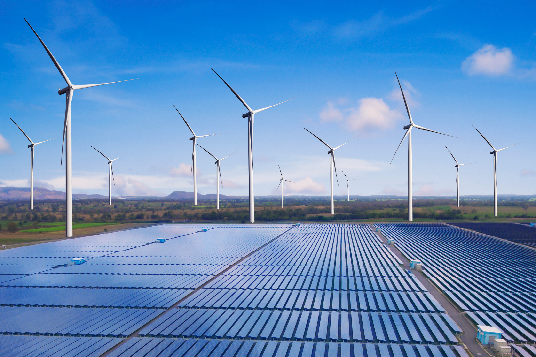 Solar panel and wind turbine farm clean energy.