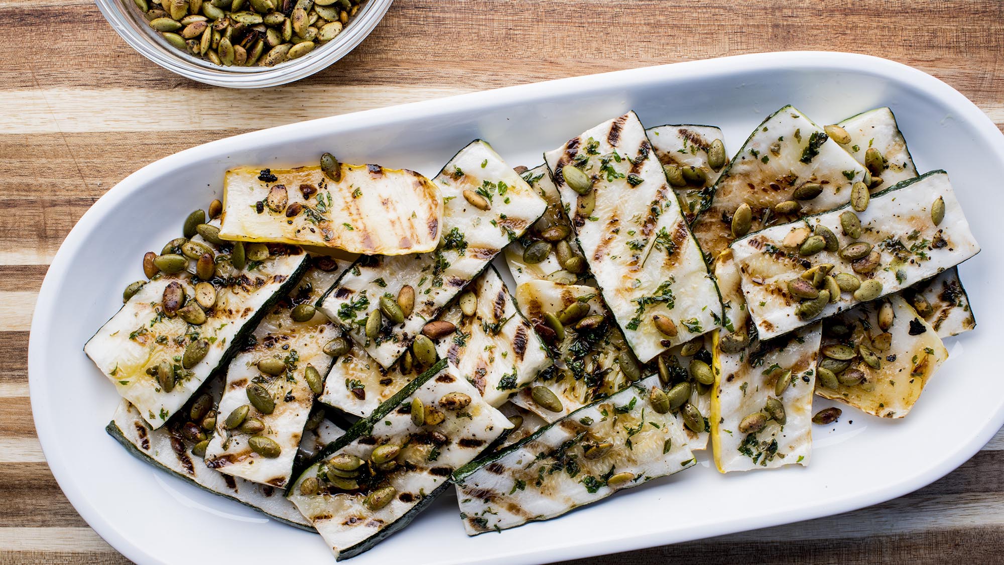 grilled_zucchini_and_squash_with_brown_sugar_bourbon_pumpkin_seeds_2000x1125.jpg