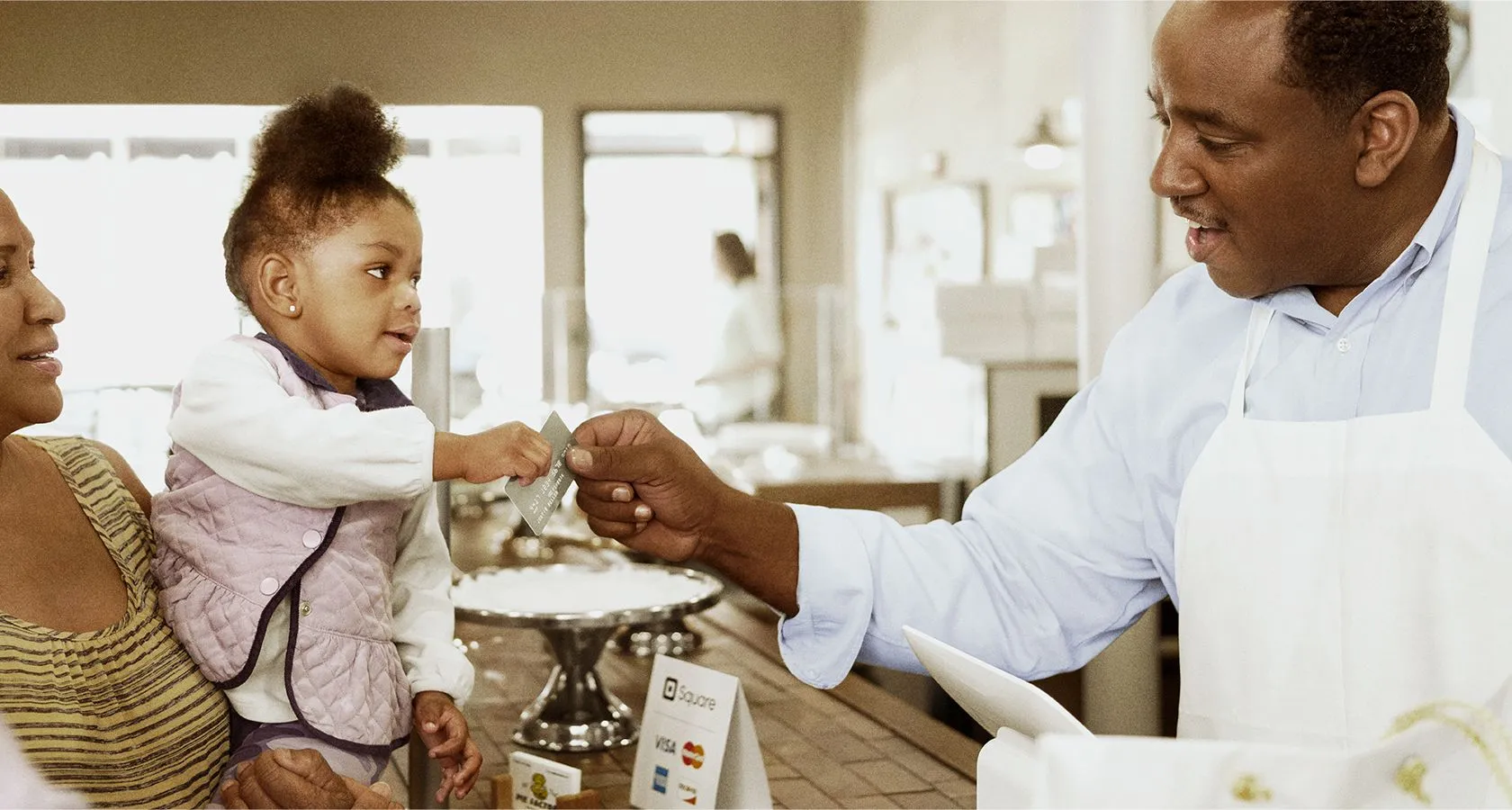 Child paying with credit card