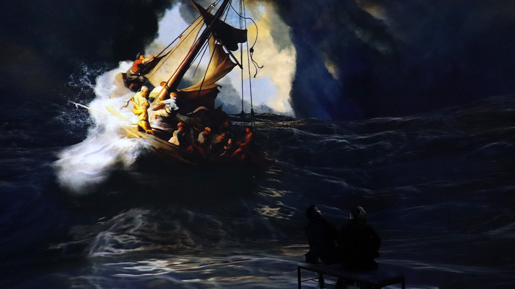 Digital art; a Rembrandt painting is digitized and projected onto a wall in a gallery