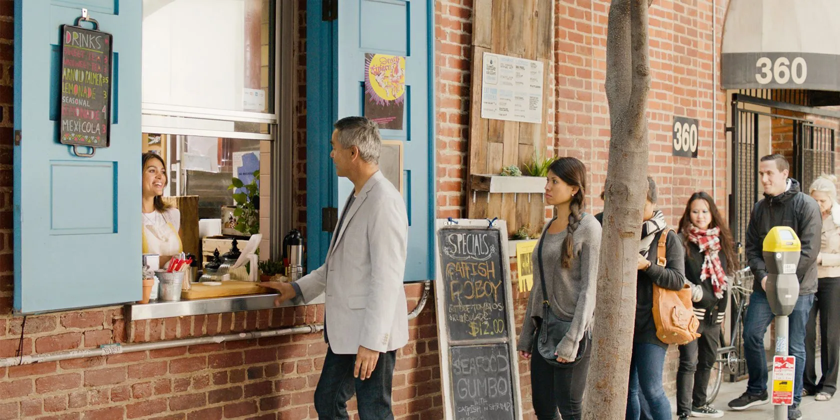 Customers ordering at counter