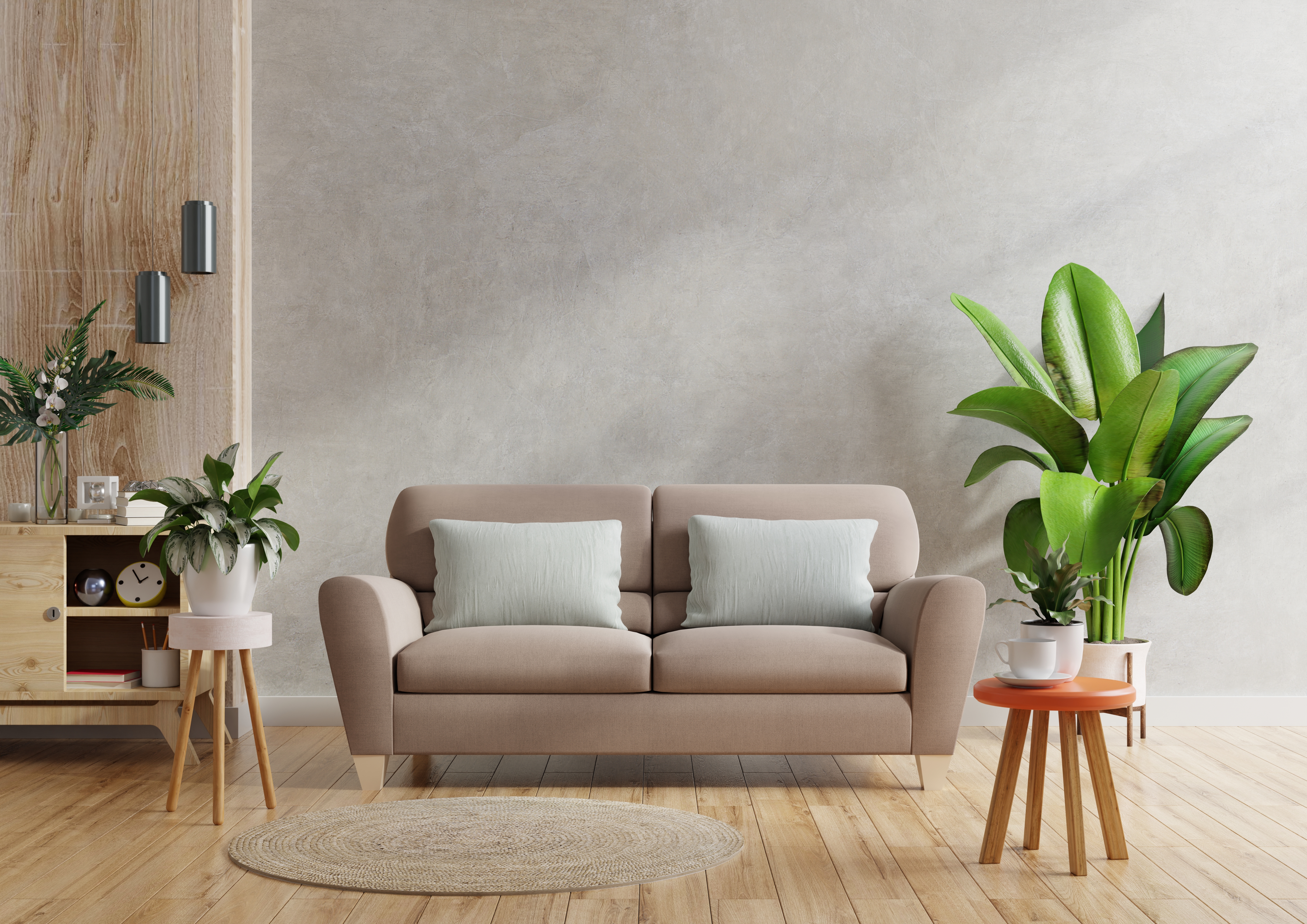 brown-sofa-wooden-table-living-room-interior-with-plant-concrete-wall.jpg