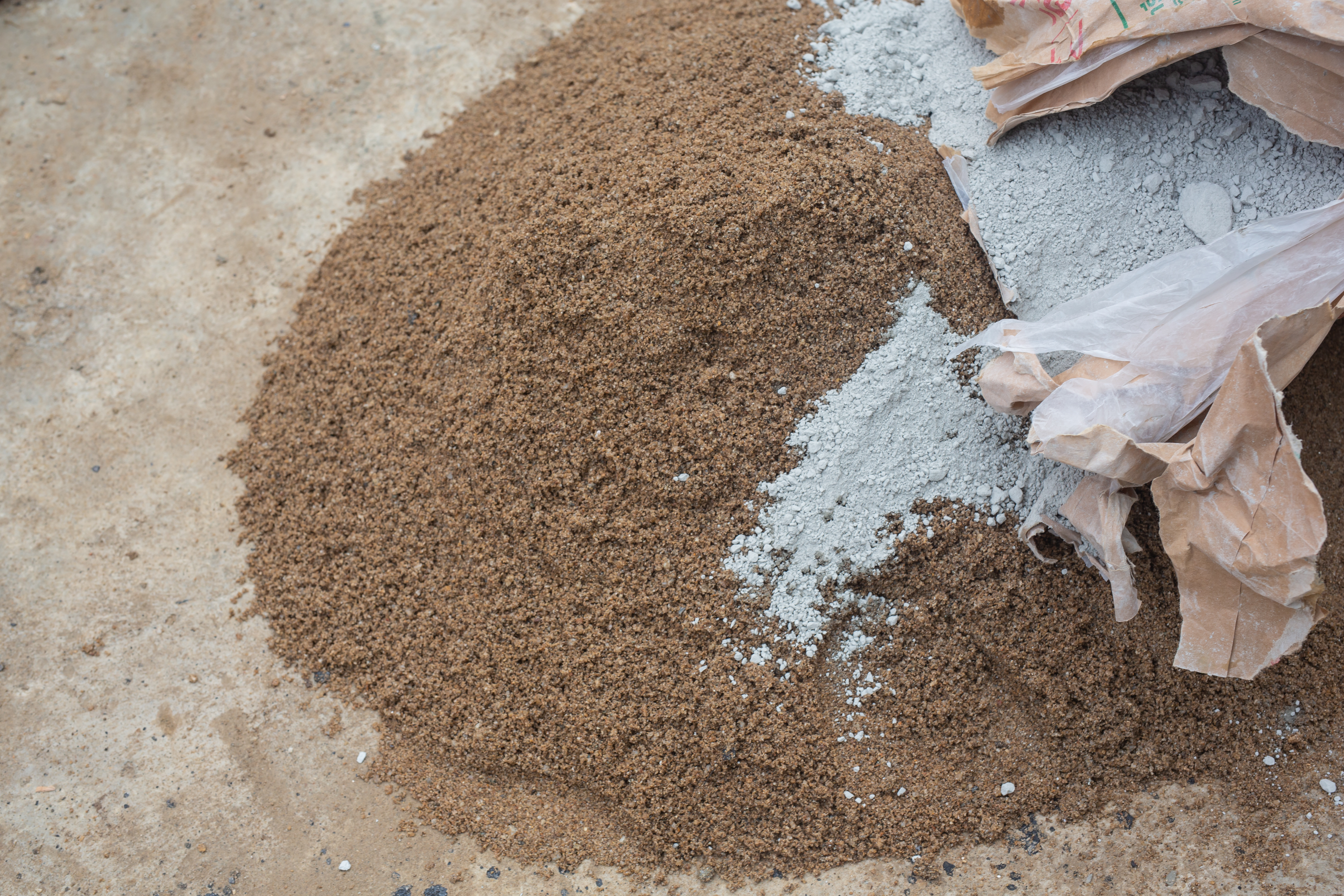 construction-technicians-are-mixing-cement-stone-sand-construction.jpg