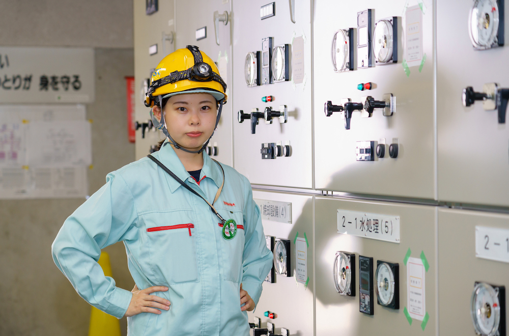 Ujike in the control room of the site where she currently works