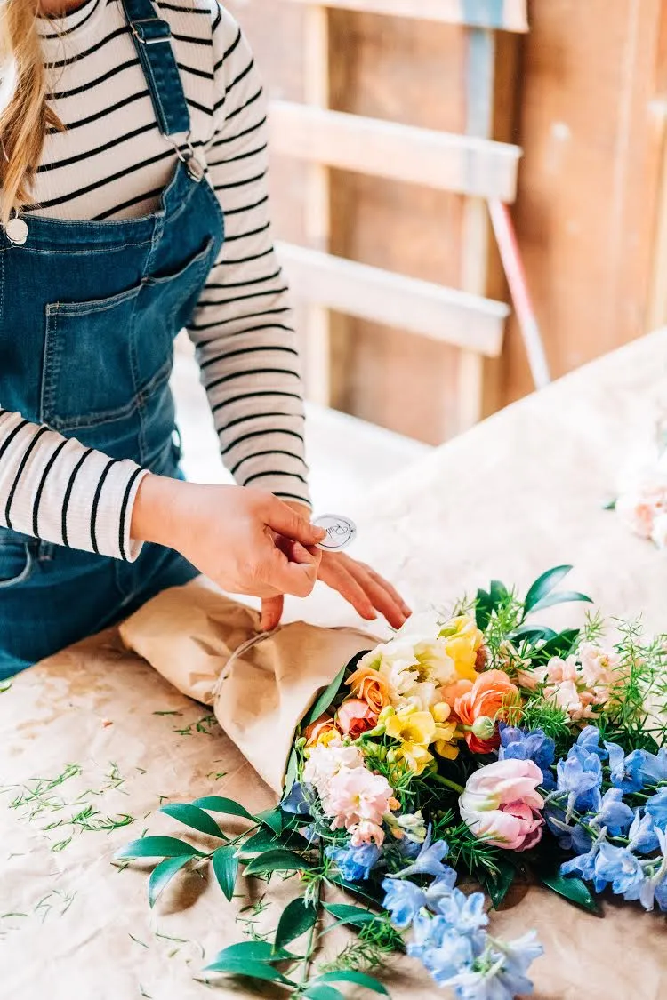 business owner making a bouquet