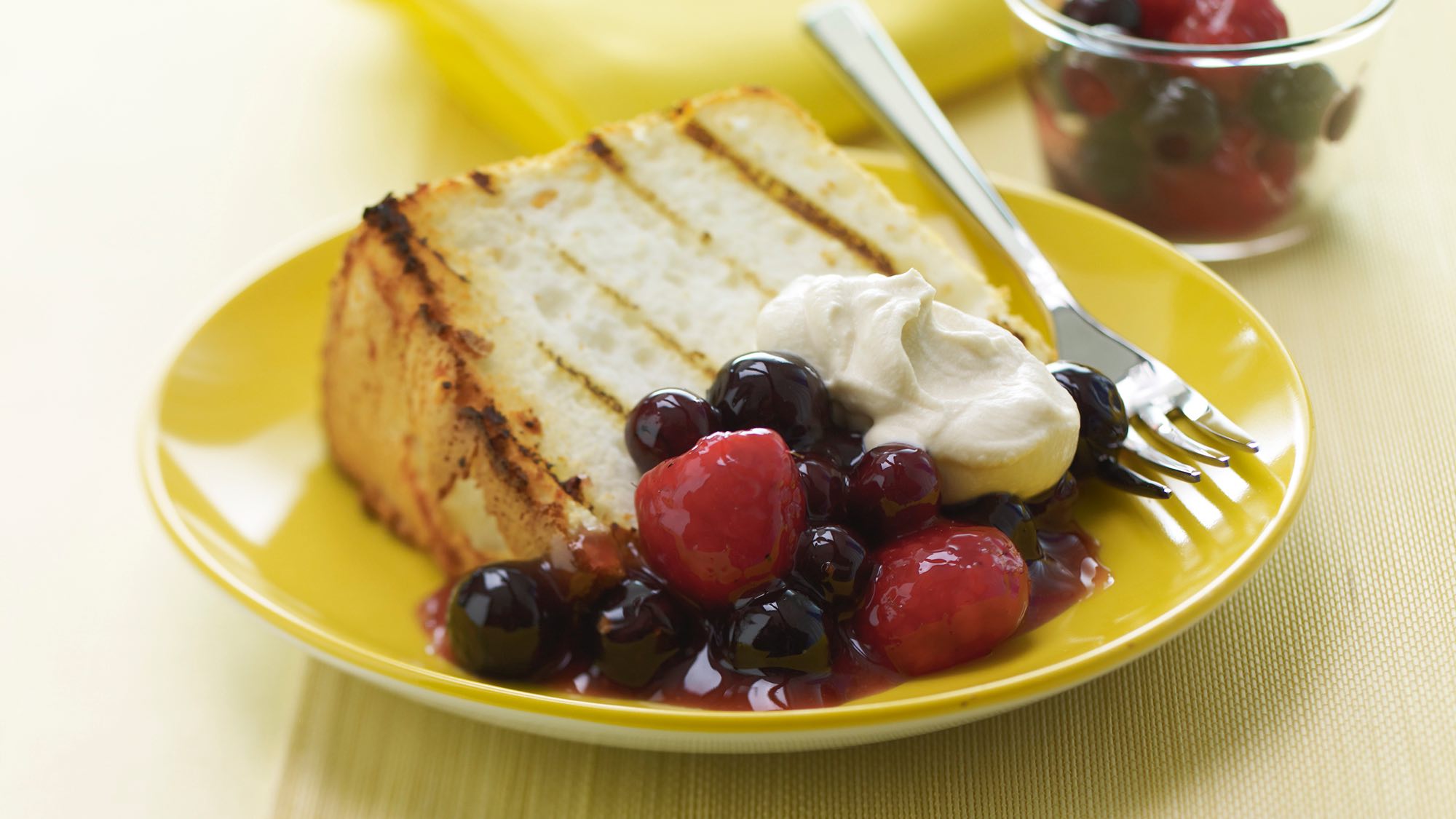 McCormick Grilled Angel Food Cake with Peppered Berries and Vanilla Cream