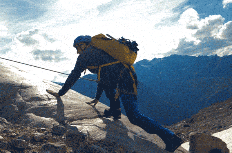 Man rock climbing in the mountains