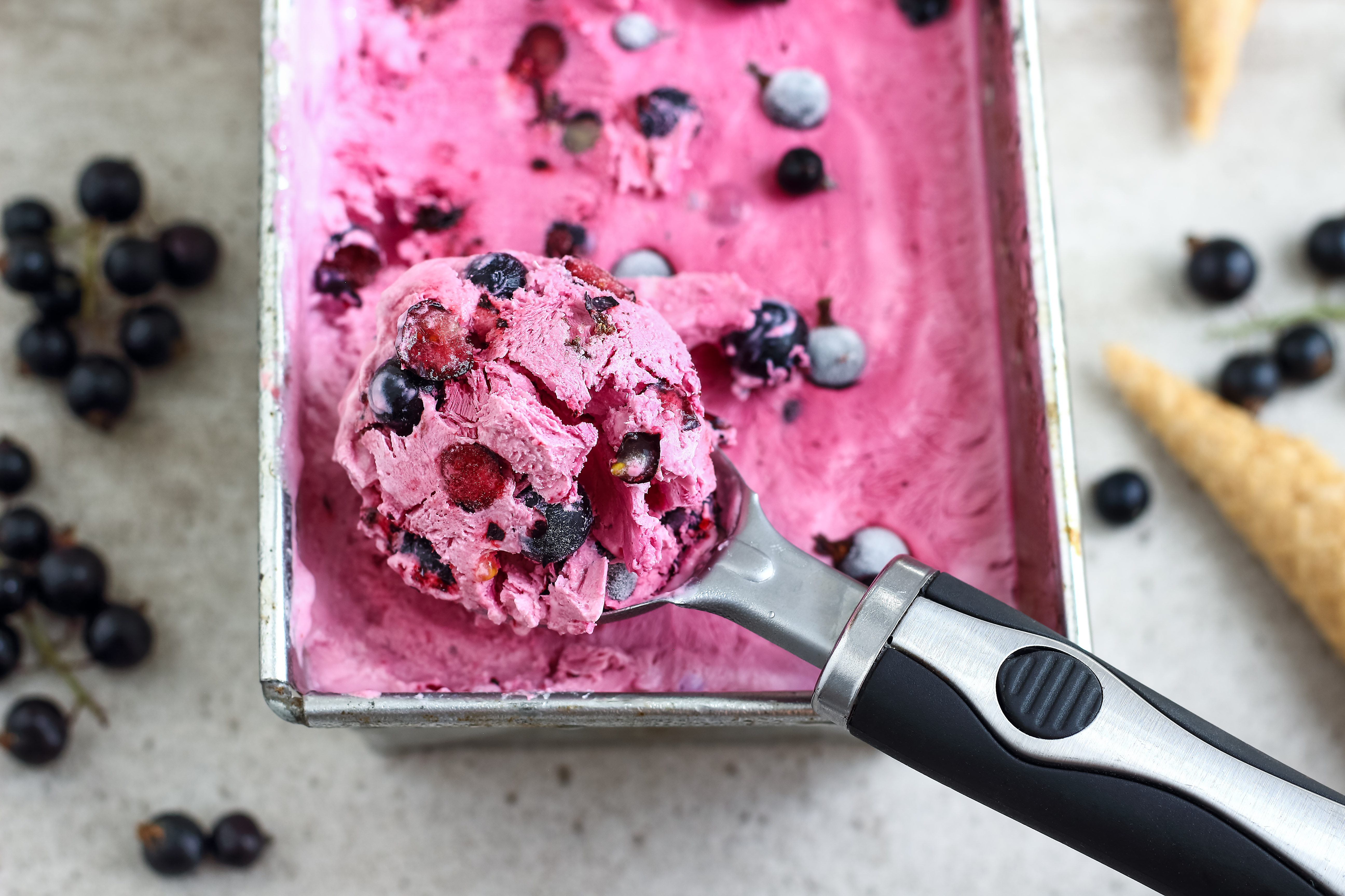 Scoop of Strawberry Ice Cream with Fresh Blueberries