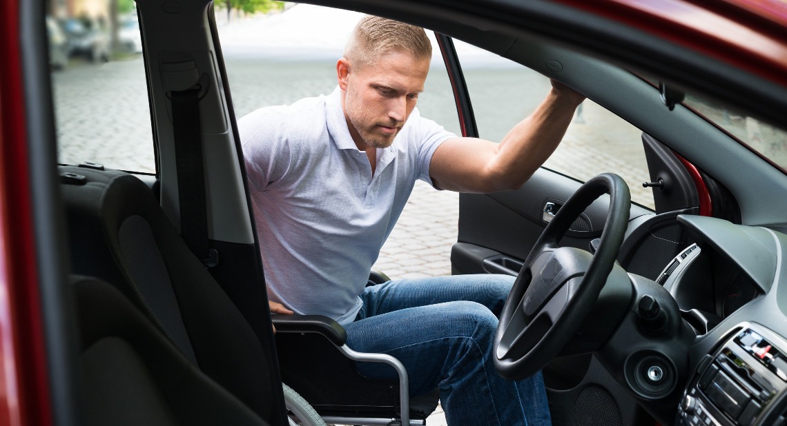 Disabled Man Boarding In His Car