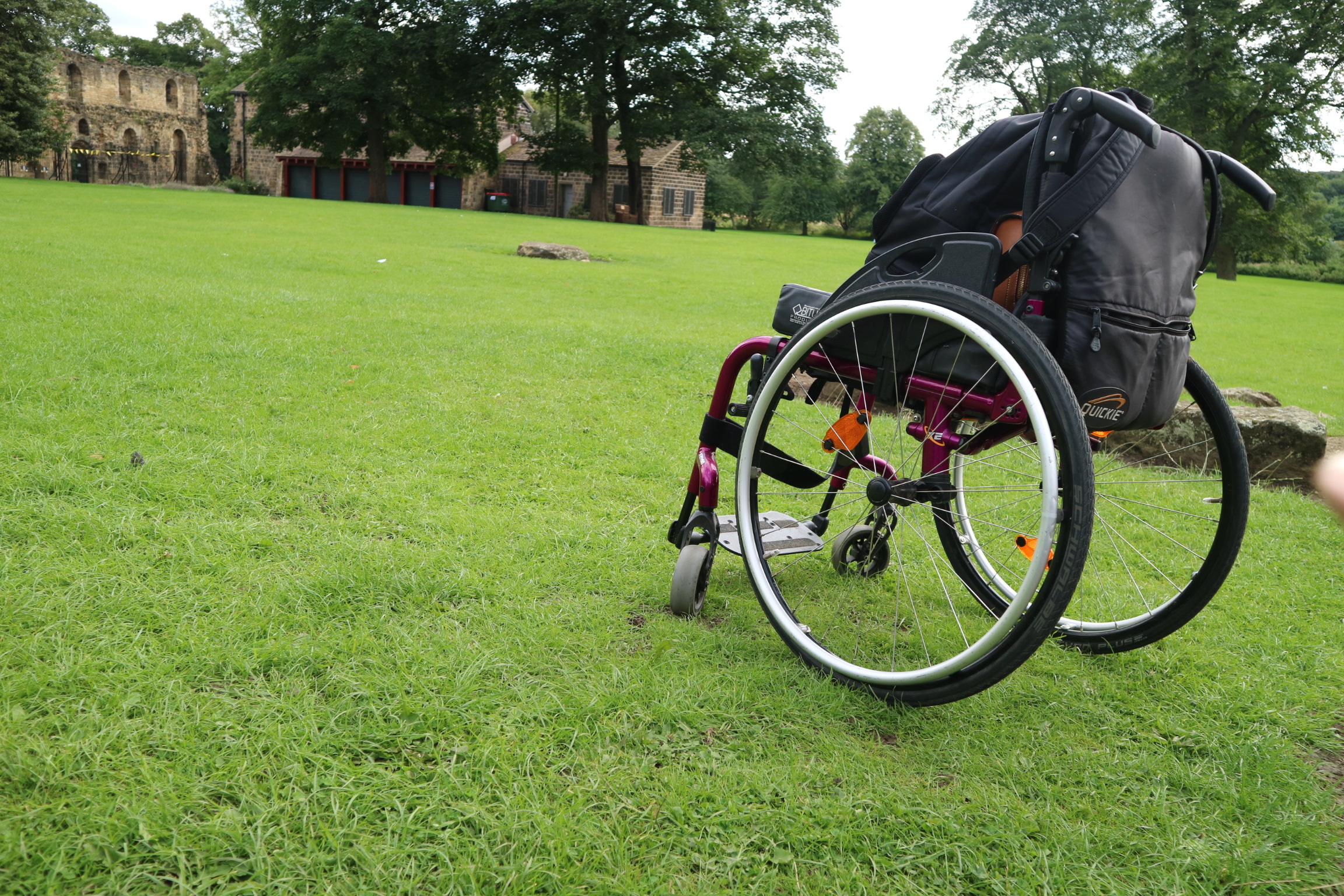 a wheelchair with accessories and mobility aids