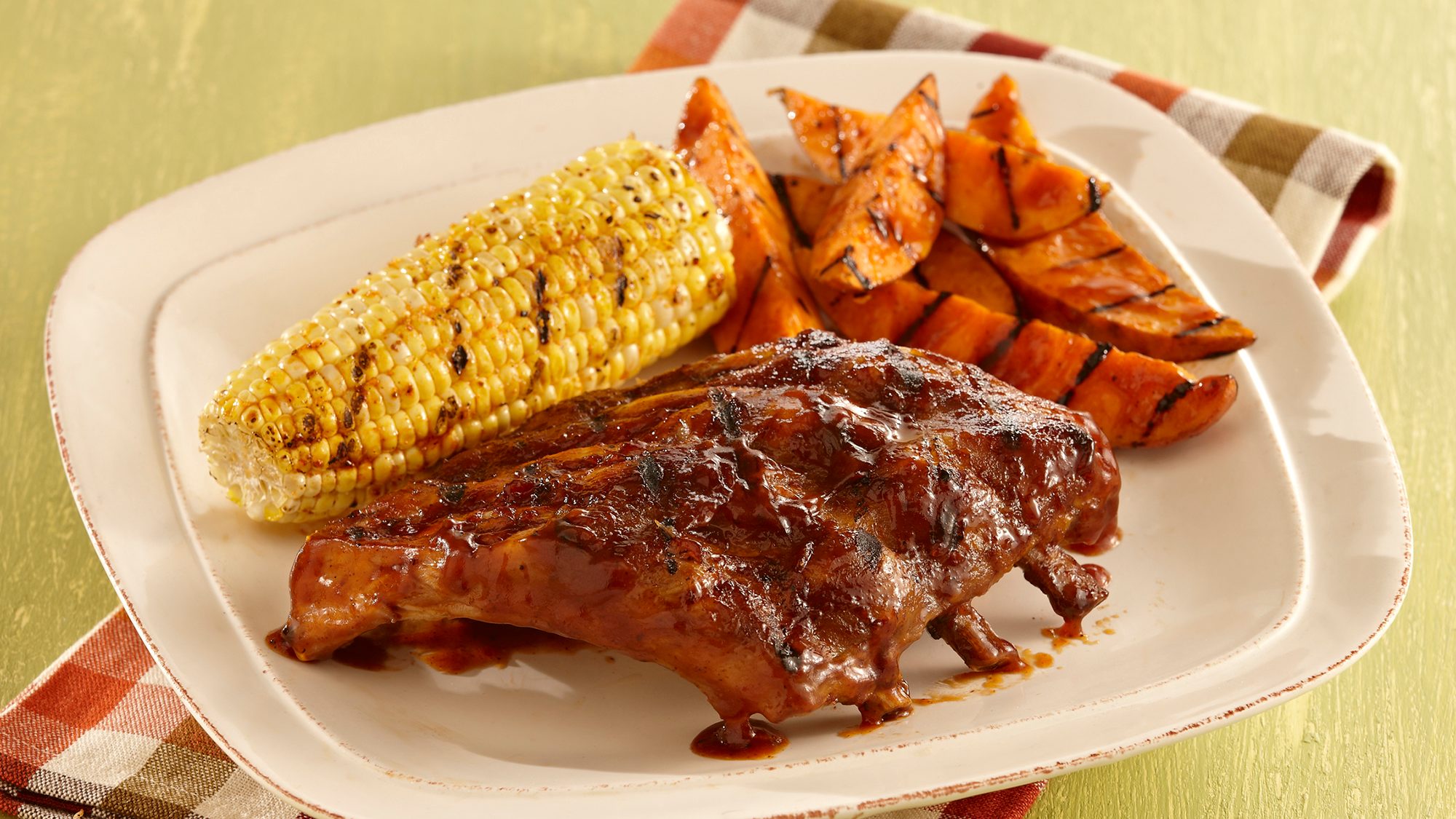 sweet-and-smoky-ribs-with-grilled-sweet-potatoes.jpg