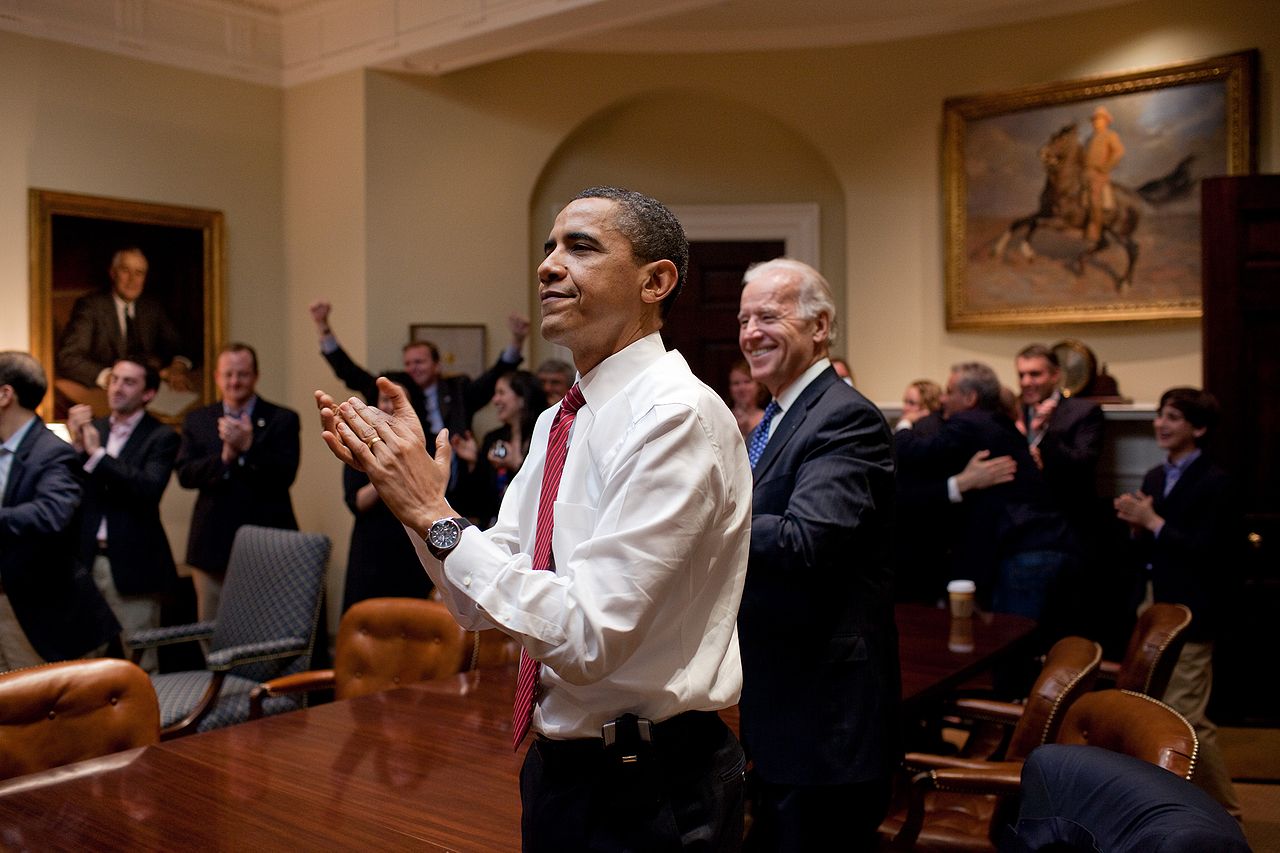 President Obama and Vice President Biden react to the passage of the Affordable Care Act on March 21, 2010.