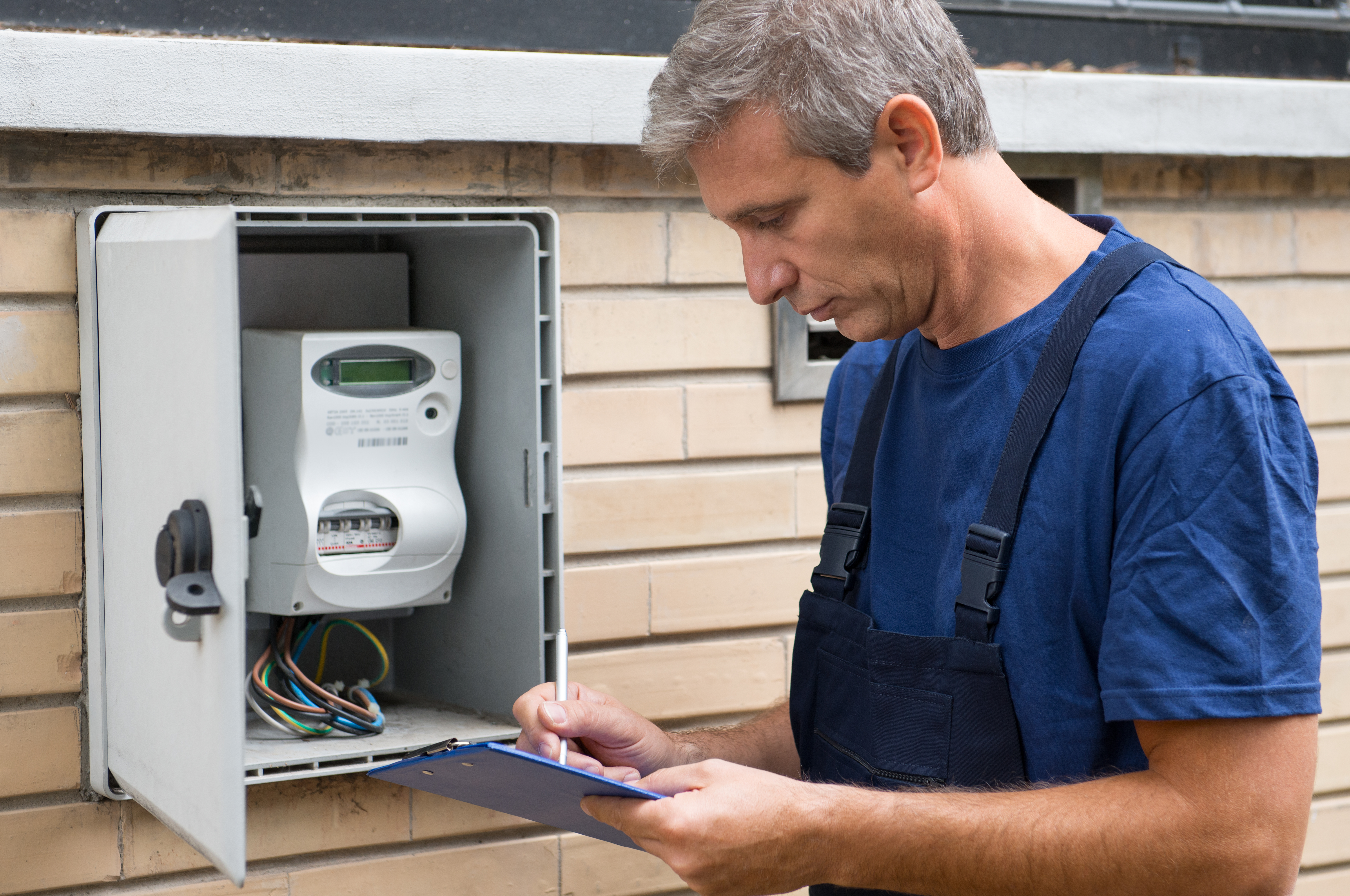 Electrician Taking Meter Readings