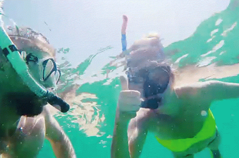 A man and woman snorkeling 