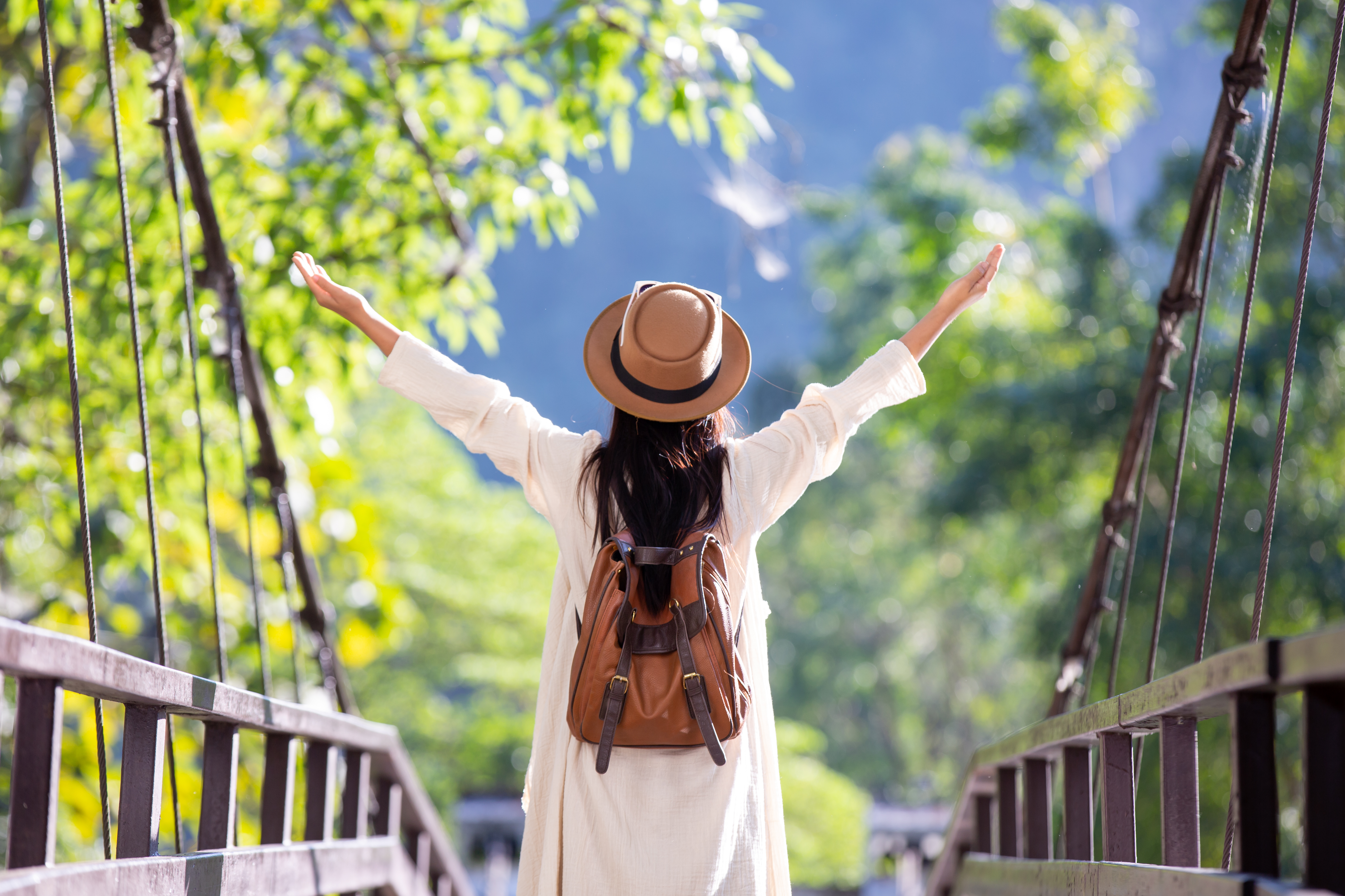 female-tourists-spread-their-arms-held-their-wings.jpg