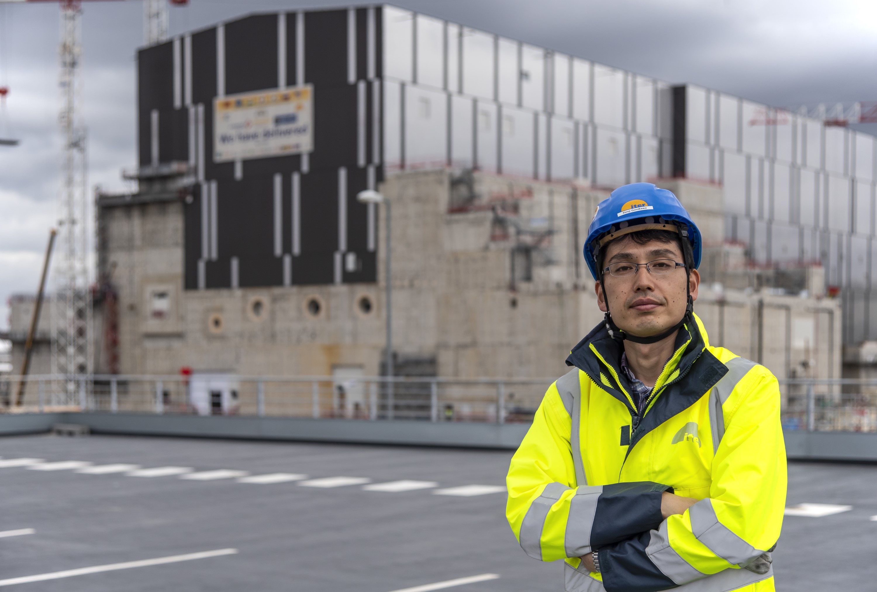 Kenji Gomikawa in front of the Tokamak building