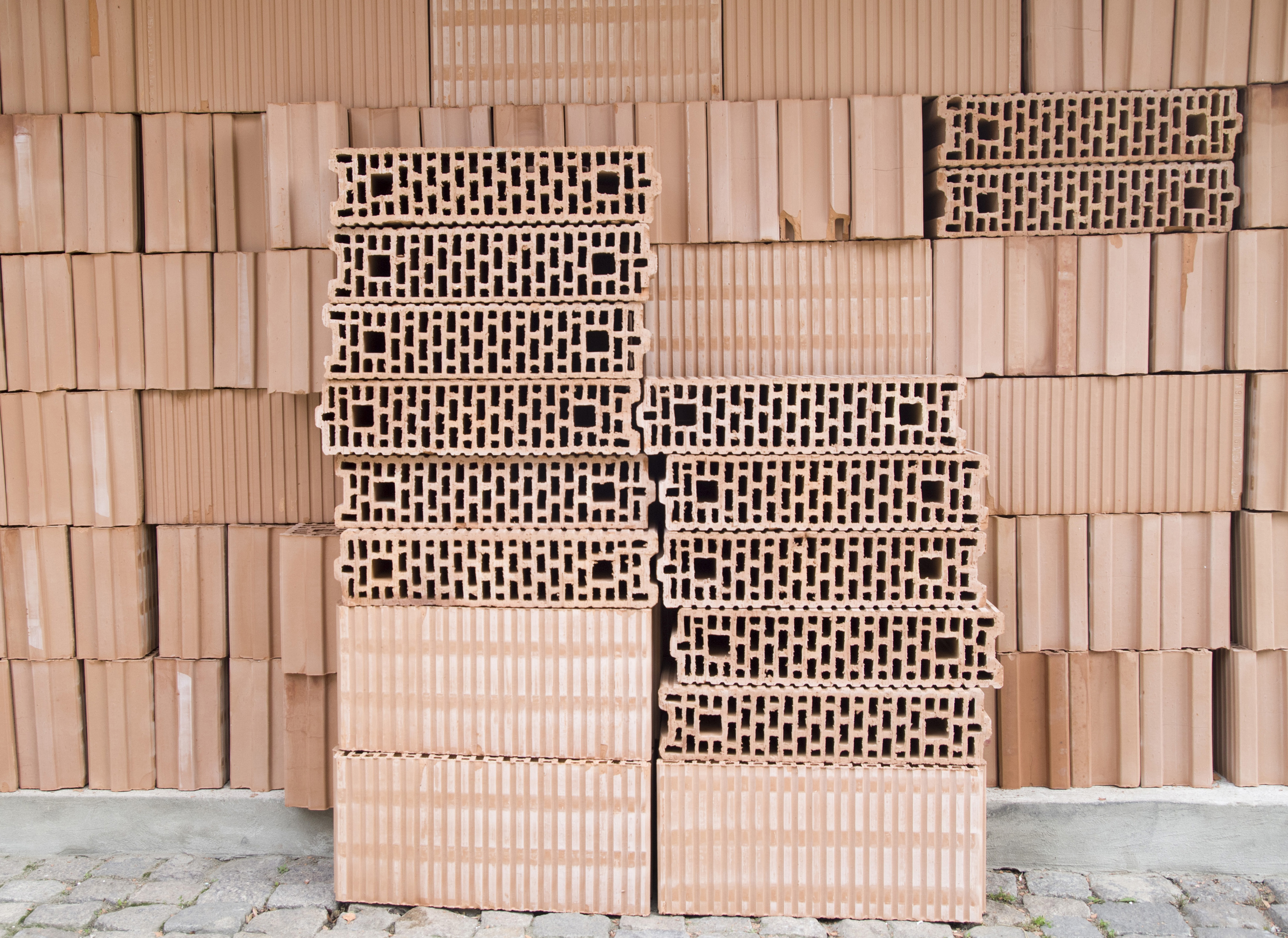 Pile of new modern porotherm bricks closeup