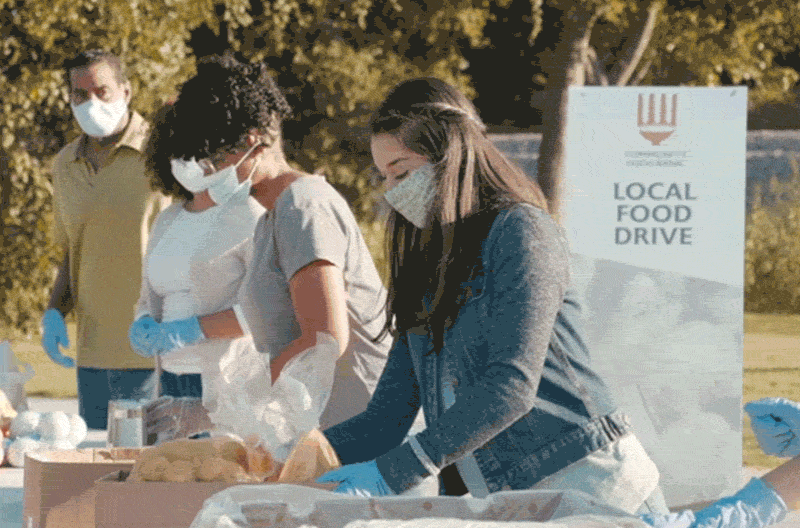 A team of volunteers organizing food donations