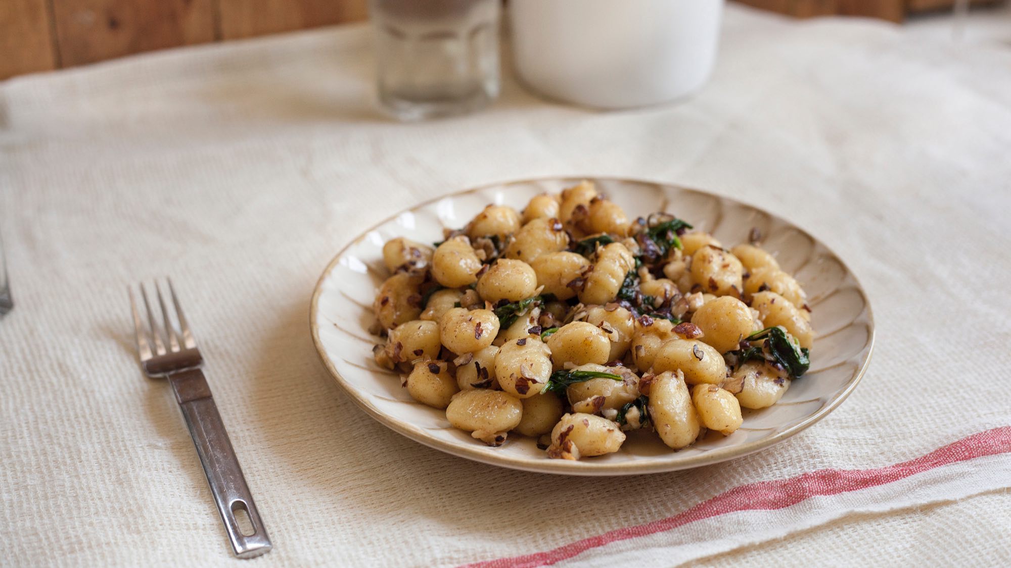gnocchi-in-vanilla-brown-butter-sauce-with-baby-spinach-and-toasted-hazelnuts-adventures-in-cooking.jpg