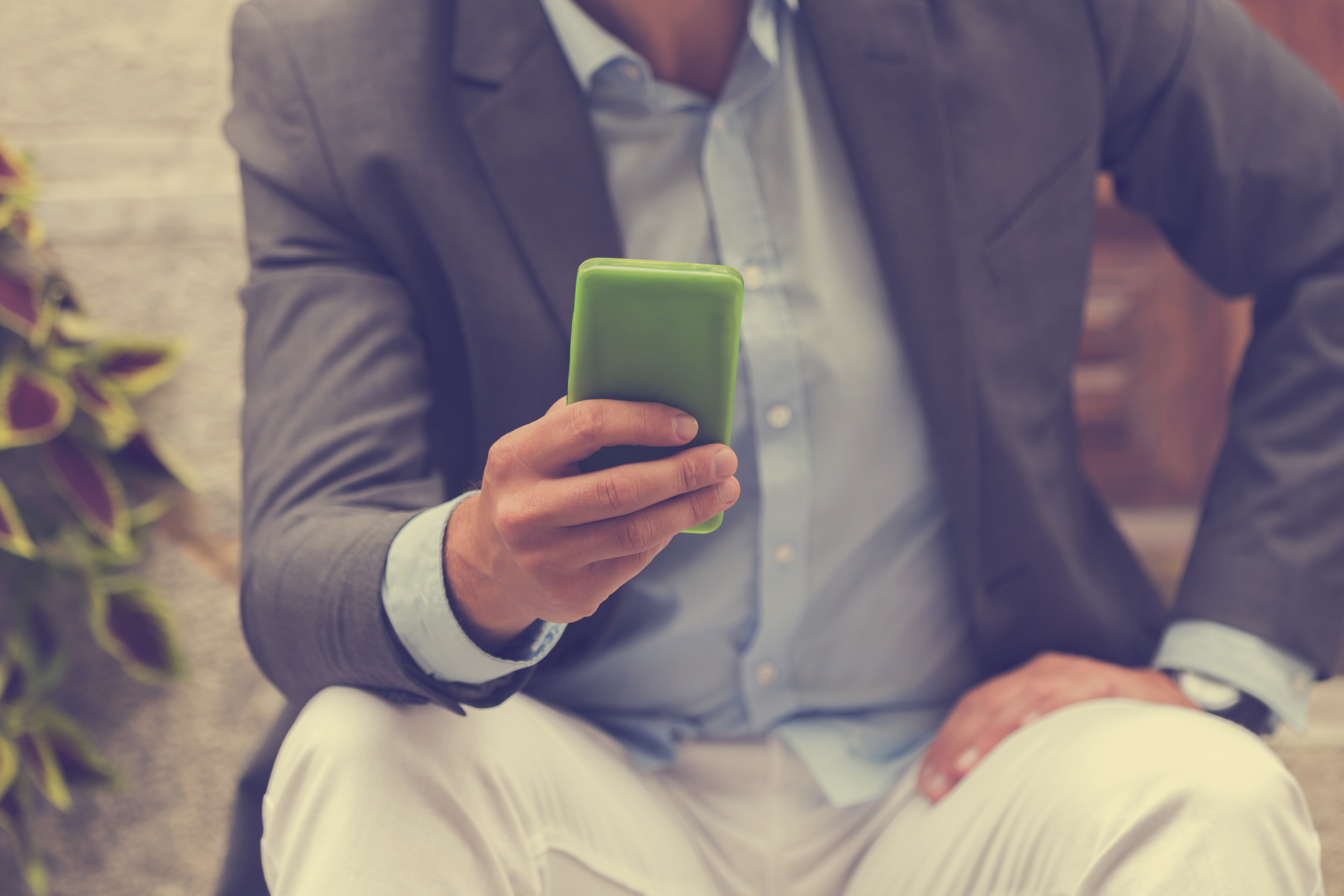 Handsome man using smartphone.jfif