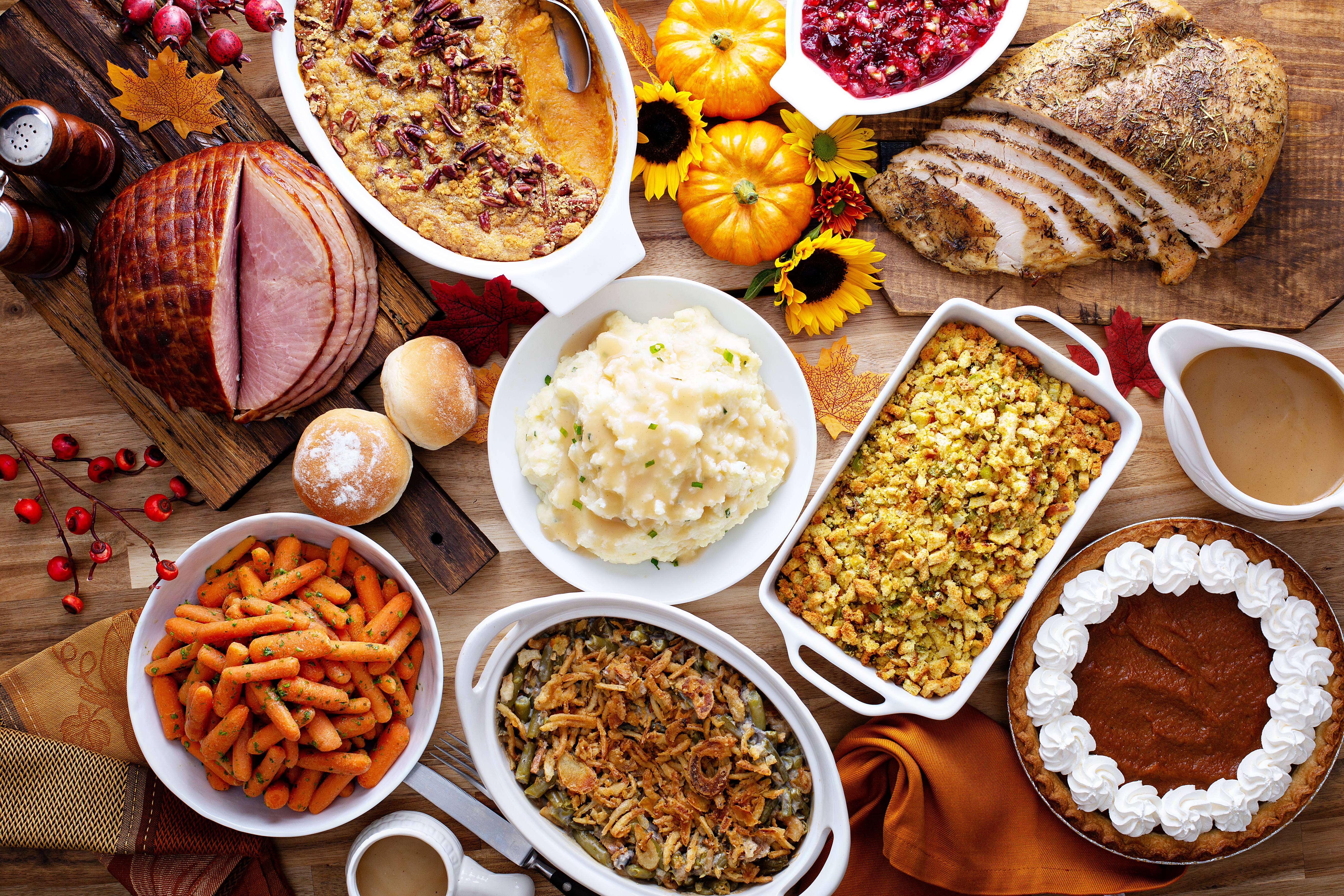 Thanksgiving table with turkey and sides