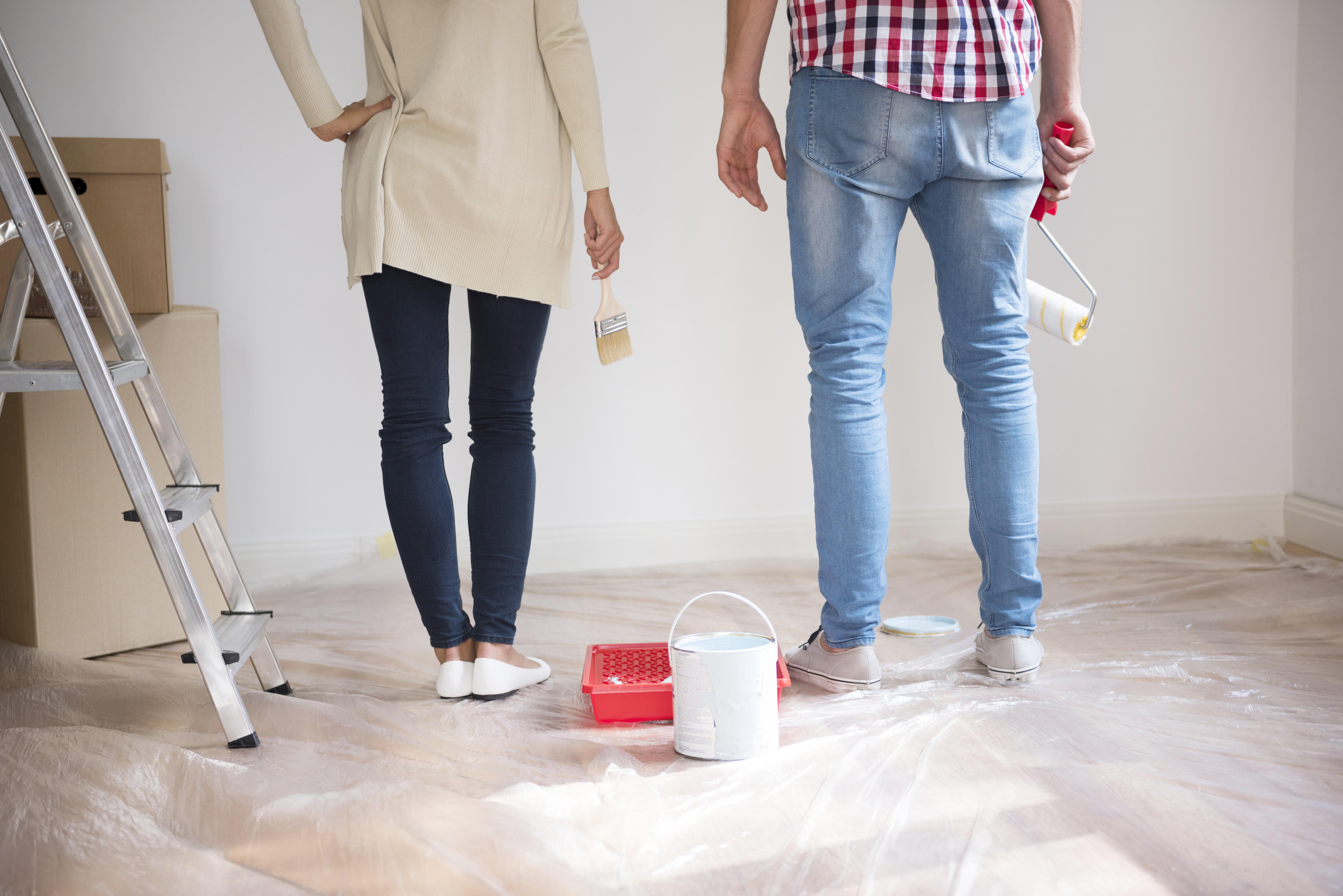 young-couple-painting-walls.jpg